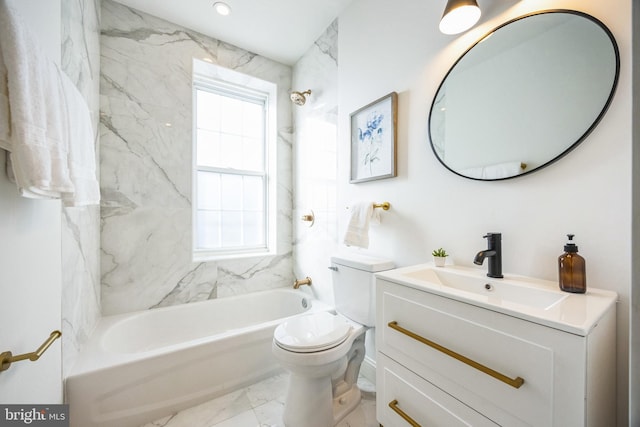 full bathroom featuring vanity, toilet, and tiled shower / bath