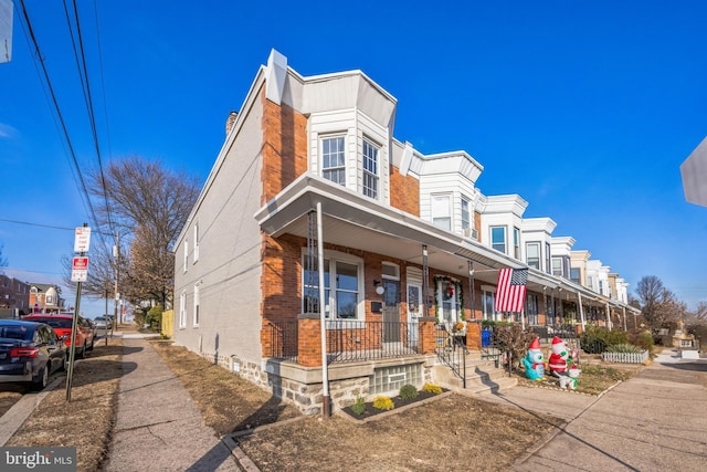 view of property with covered porch