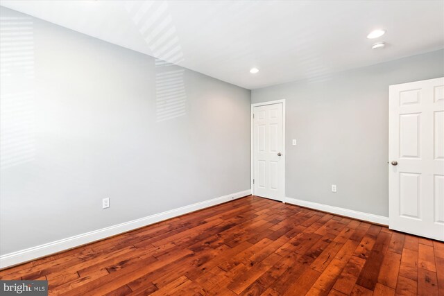 931 Farragut St NW, Washington, DC 20011 - spare room with baseboards, wood-type flooring, and recessed lighting