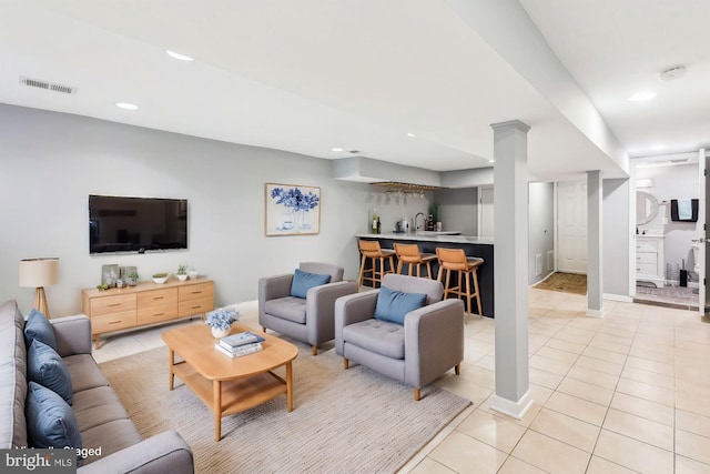 931 Farragut St NW, Washington, DC 20011 - living area featuring visible vents, light tile patterned flooring, baseboards, indoor wet bar, and recessed lighting