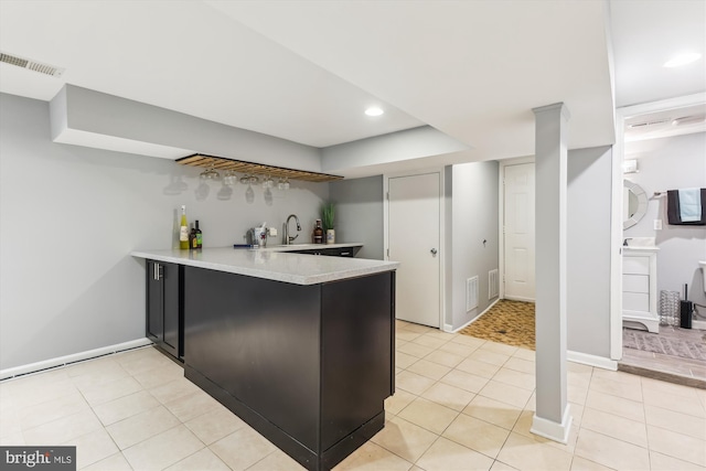 931 Farragut St NW, Washington, DC 20011 - bar with a sink, baseboards, light tile patterned flooring, and visible vents