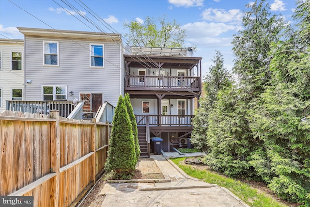 931 Farragut St NW, Washington, DC 20011 - back of house featuring fence and stairway