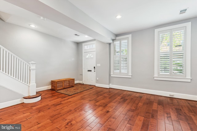 931 Farragut St NW, Washington, DC 20011 - foyer with wood-type flooring, baseboards, visible vents, and stairway