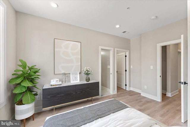 bedroom with light hardwood / wood-style floors