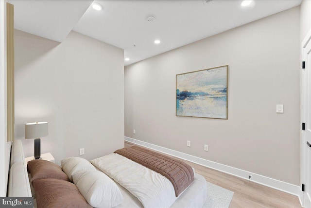 bedroom featuring light wood-type flooring