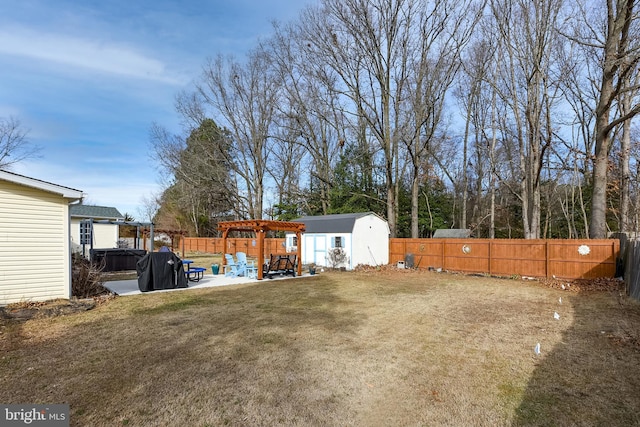 view of yard featuring a pergola, a storage unit, and a patio area