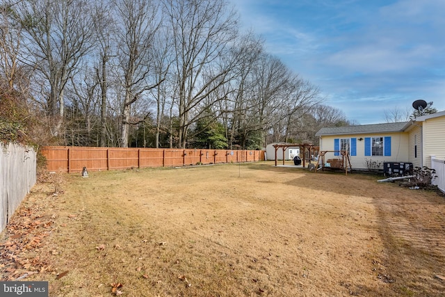 view of yard with a carport