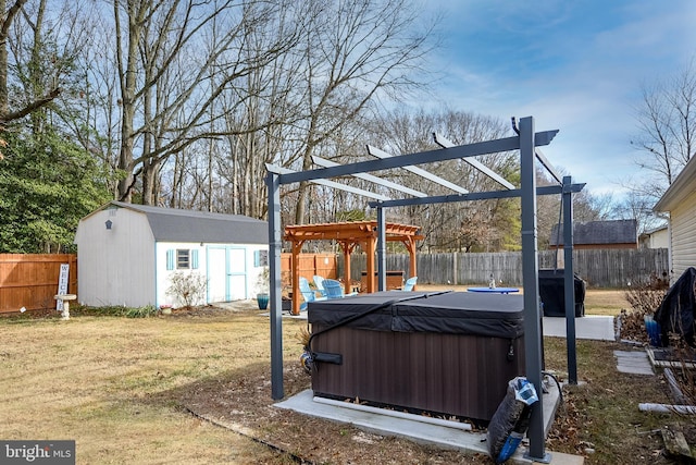 view of yard with a shed, a pergola, and a hot tub