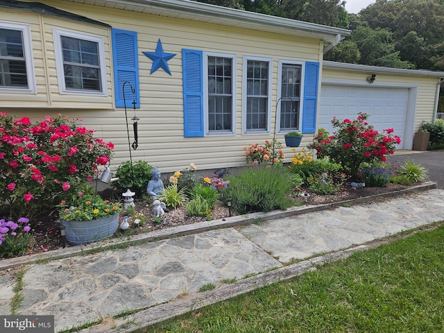 exterior space with a garage