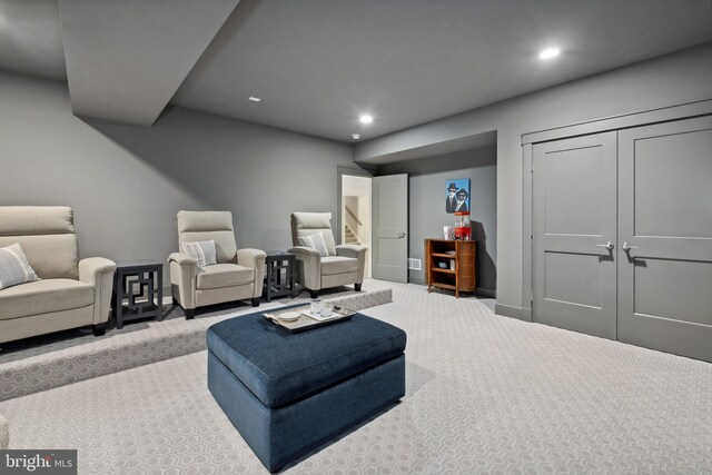 sitting room with light colored carpet