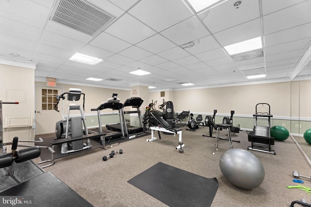 gym featuring a drop ceiling