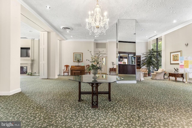 interior space featuring ornamental molding, a textured ceiling, and a notable chandelier