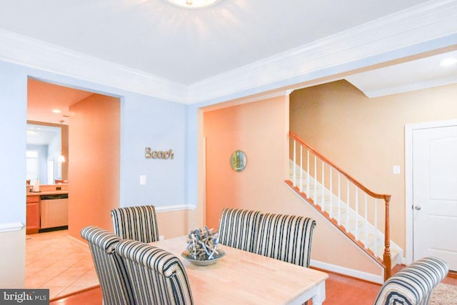 tiled dining room with ornamental molding