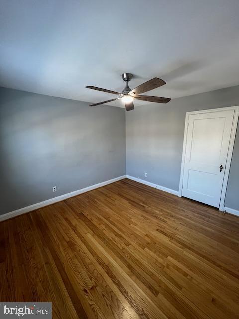 interior space with ceiling fan and hardwood / wood-style floors