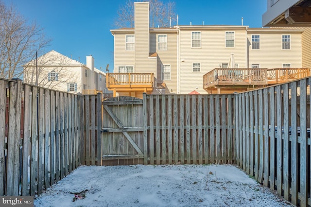 view of yard layered in snow