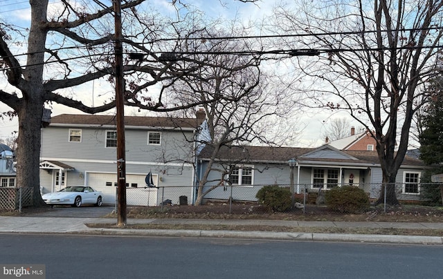 view of front of property featuring a garage