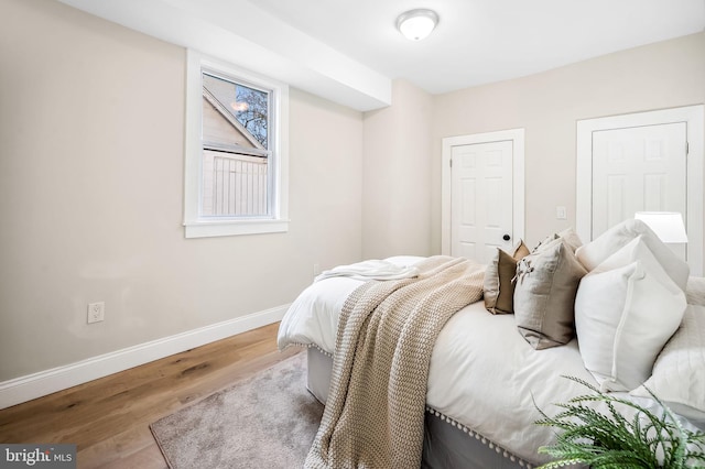 bedroom featuring light hardwood / wood-style floors