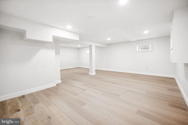 basement featuring light wood-type flooring