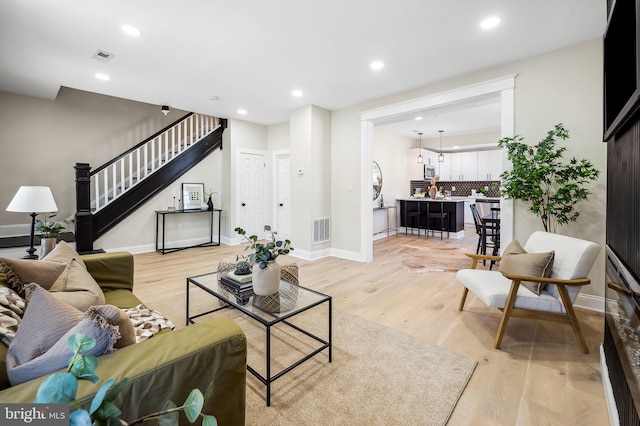 living room featuring light wood-type flooring