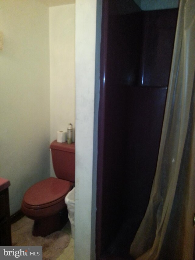 bathroom featuring toilet