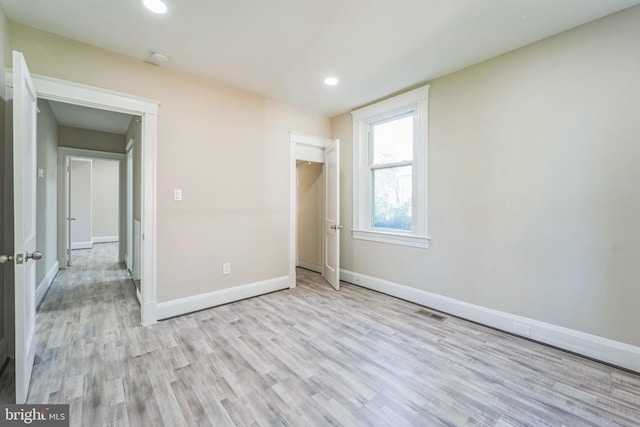 unfurnished bedroom with light hardwood / wood-style flooring