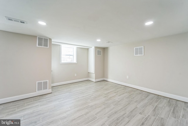 basement featuring light hardwood / wood-style floors