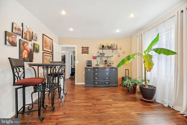 dining area with dark wood-type flooring