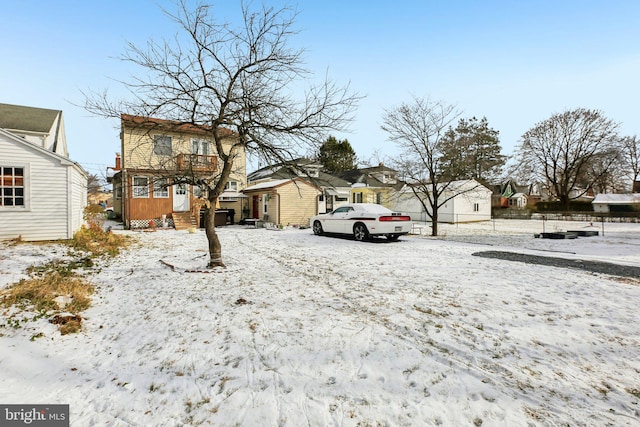 view of yard layered in snow