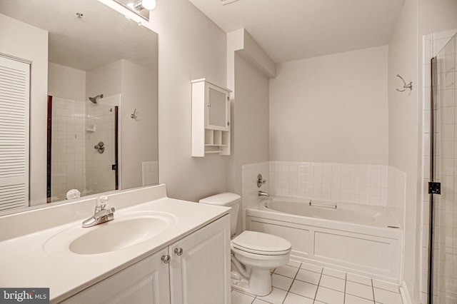 full bathroom with toilet, tiled shower, a bath, tile patterned floors, and vanity