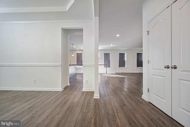 interior space with recessed lighting, baseboards, and wood finished floors