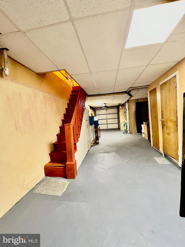 basement with a drop ceiling