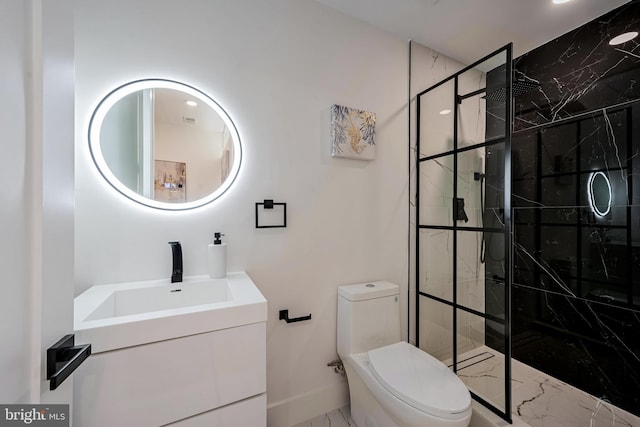 bathroom with walk in shower, vanity, and toilet