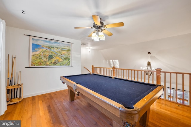 game room with ceiling fan, pool table, and hardwood / wood-style floors