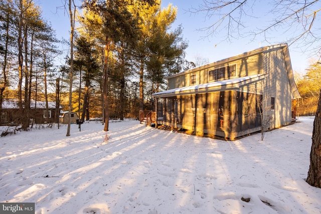 view of snow covered property