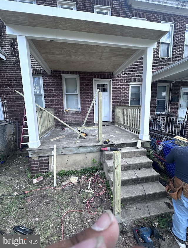 entrance to property with covered porch