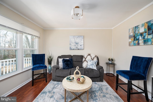 living room featuring a healthy amount of sunlight, dark hardwood / wood-style floors, and ornamental molding