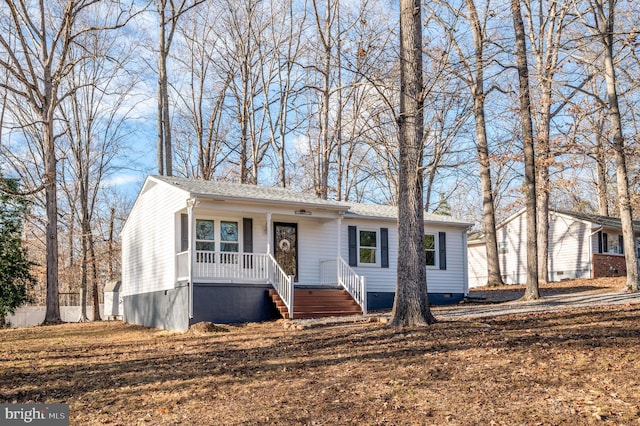 view of front of home featuring covered porch