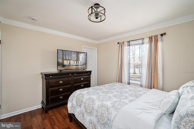 bedroom featuring ornamental molding and dark wood-type flooring