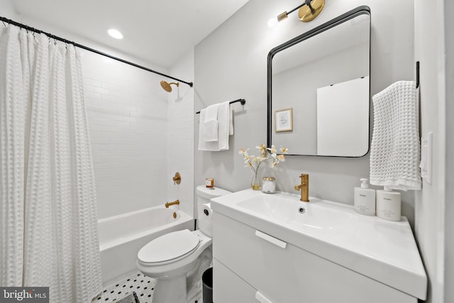 full bathroom featuring vanity, toilet, and shower / bathtub combination with curtain