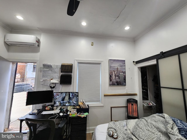 office featuring a wall mounted AC, ceiling fan, a barn door, and ornamental molding