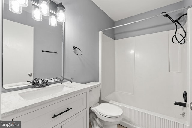 full bathroom with vanity, shower / bathtub combination, and toilet