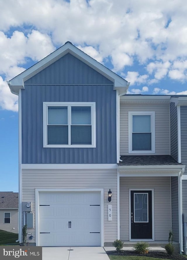 view of front of property with a garage