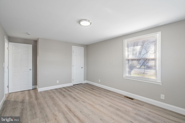 empty room featuring light wood-type flooring