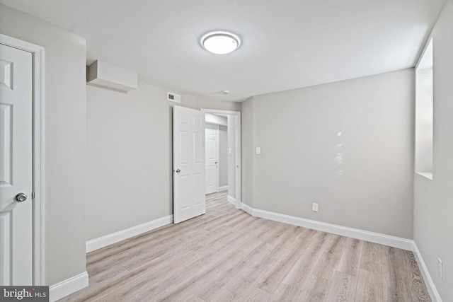 unfurnished bedroom featuring light hardwood / wood-style floors