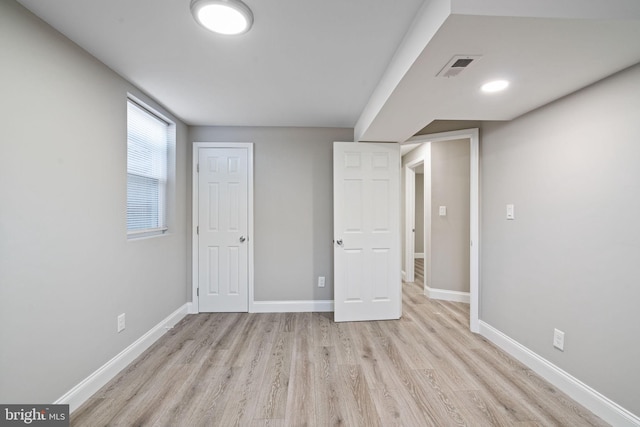 unfurnished bedroom with light hardwood / wood-style floors