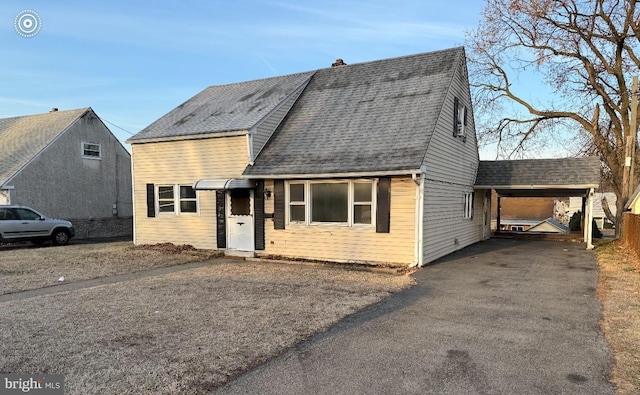 view of front of property with a carport