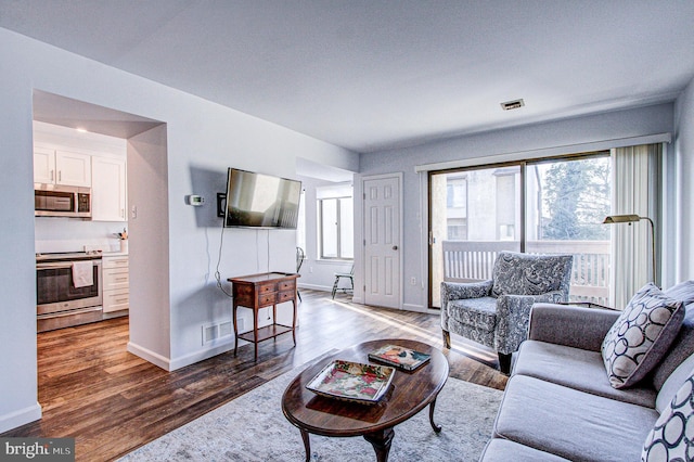 living room with hardwood / wood-style floors