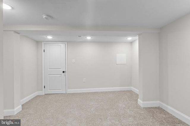 basement with light colored carpet