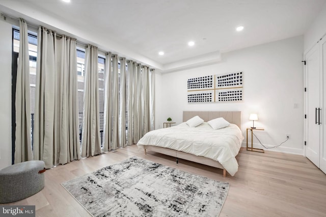 bedroom featuring light hardwood / wood-style floors