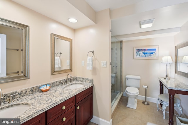 bathroom featuring walk in shower, vanity, and toilet